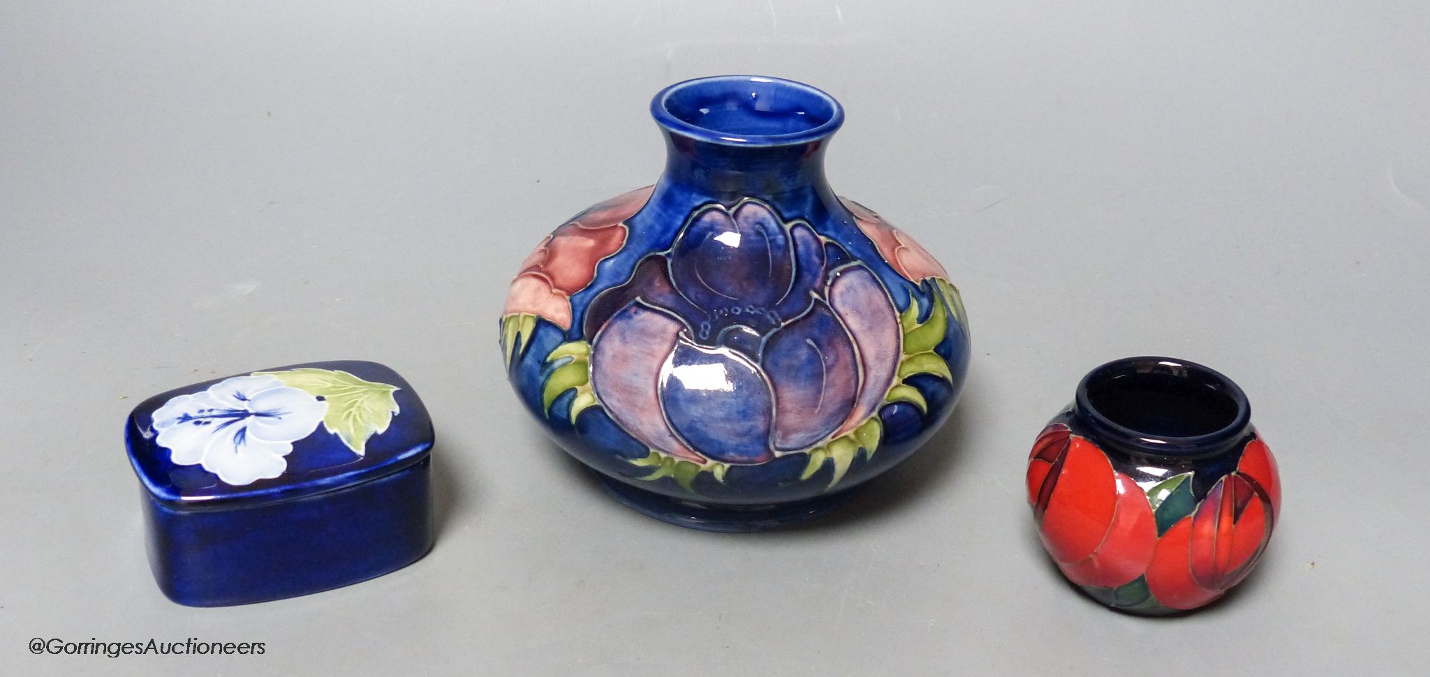 Two Moorcroft pottery vases and a lidded box (3)